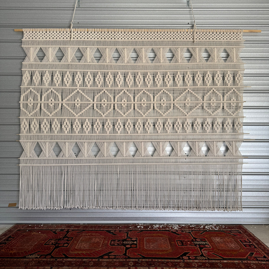 modern macrame wall hanging in a restaurant