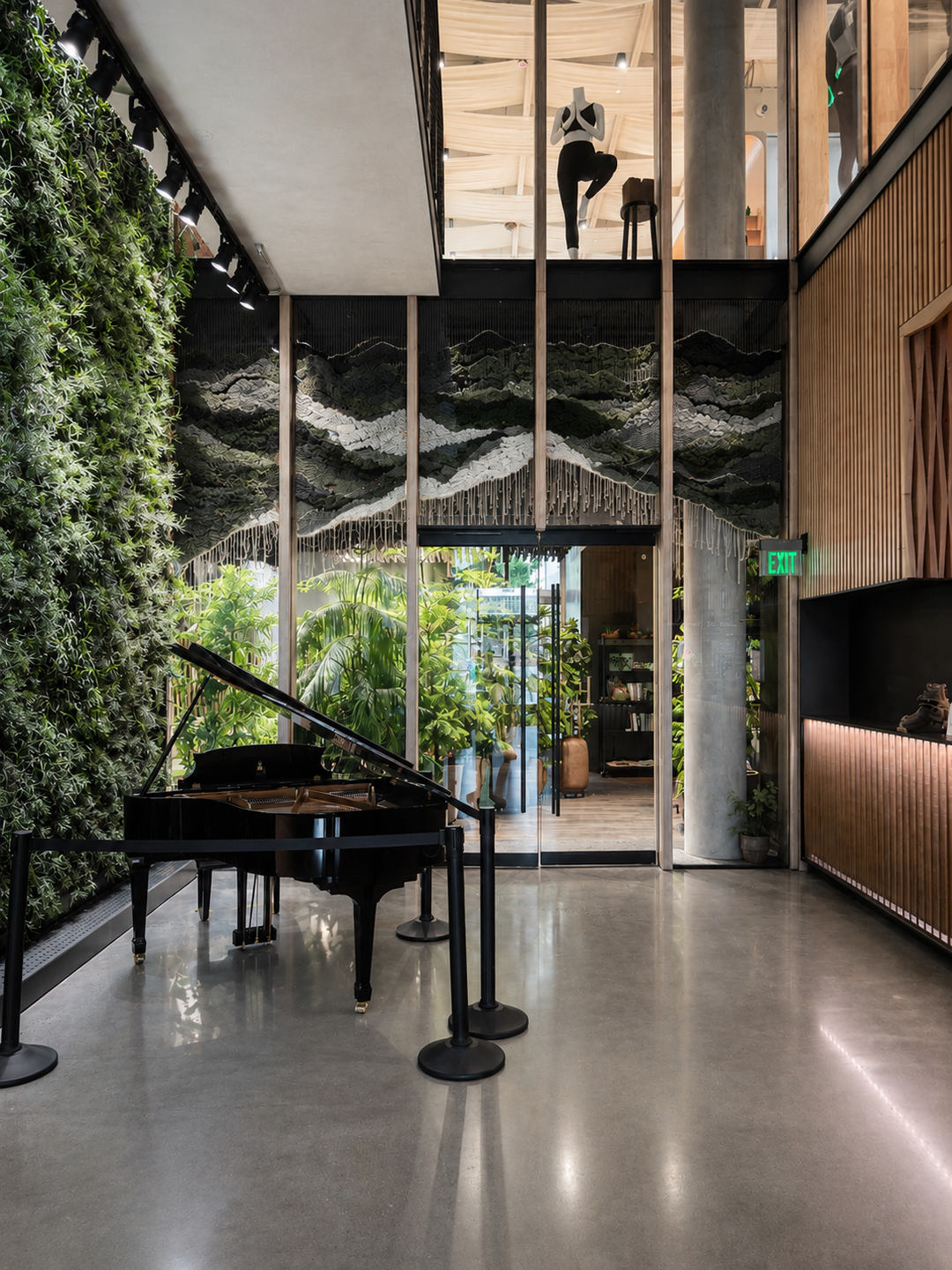 Large woven wall hanging at hotel entrance